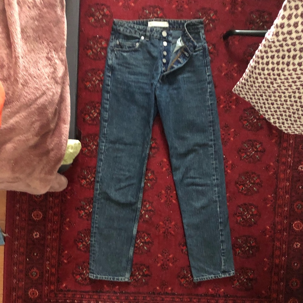 Straight leg button fly jeans in dark blue wash